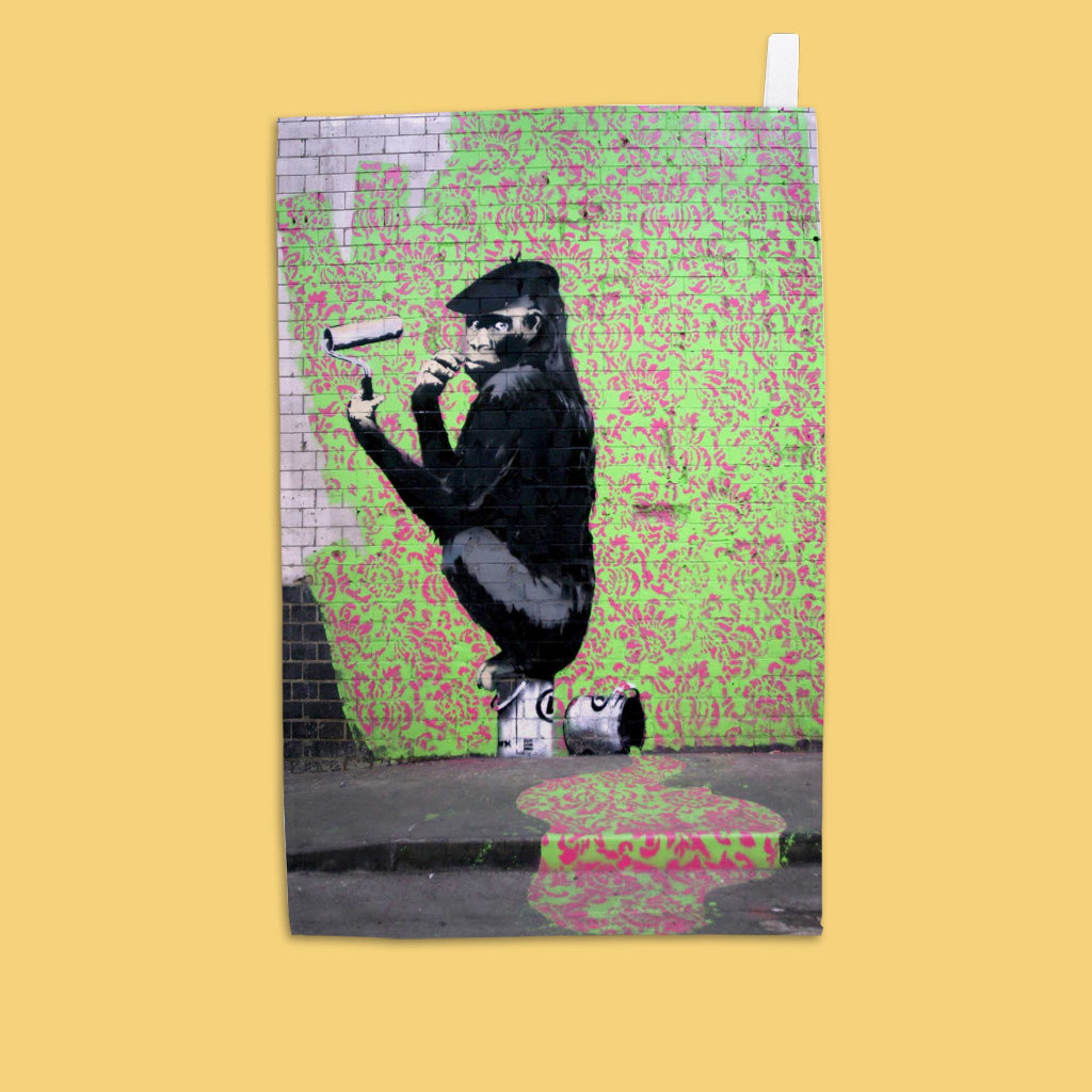 Grafitti art - Monkey siting on paint tin Tea Towel