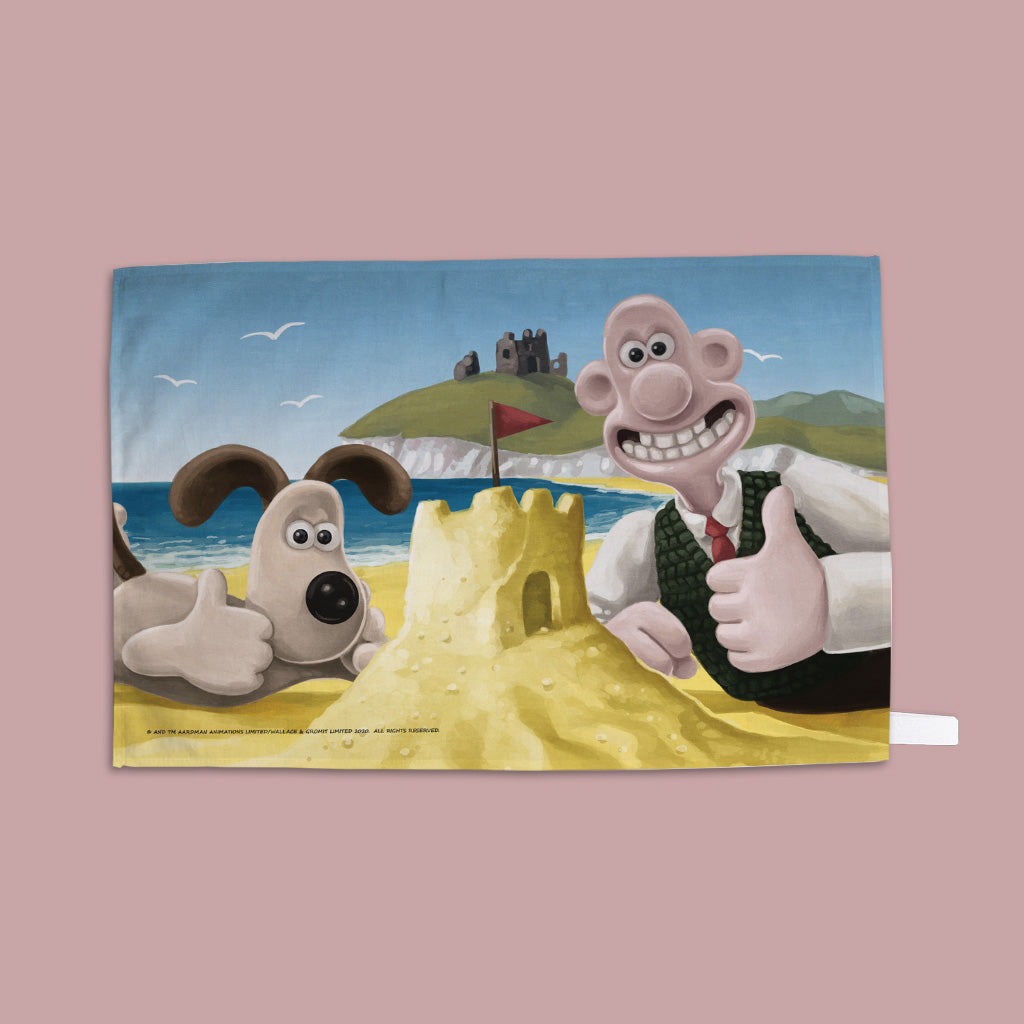 Wallace and Gromit make a Sandcastle Tea Towel