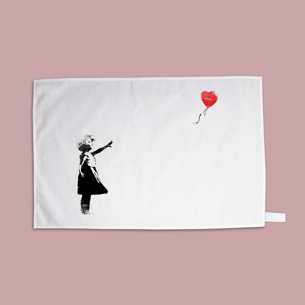 Graffiti art - Girl with heart balloon  Tea Towel