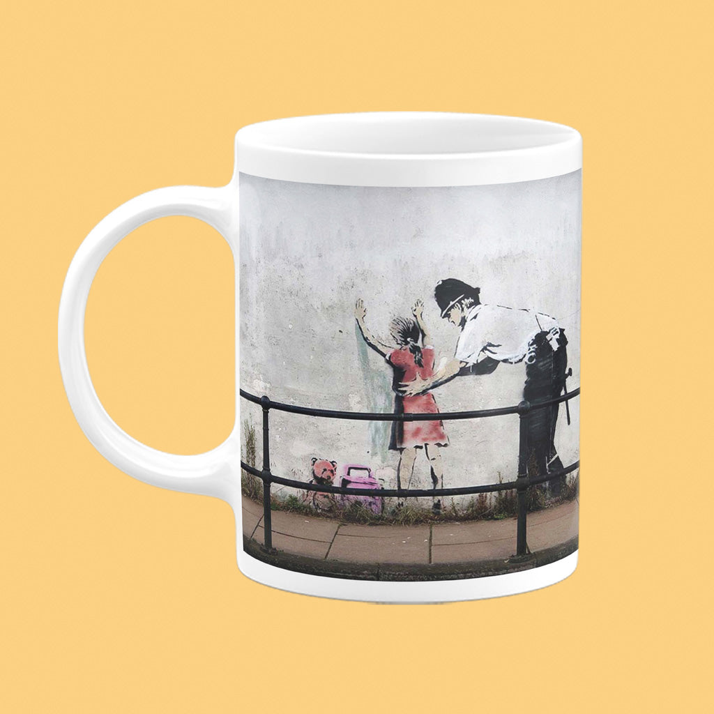 Graffiti art - Police pat down Mug